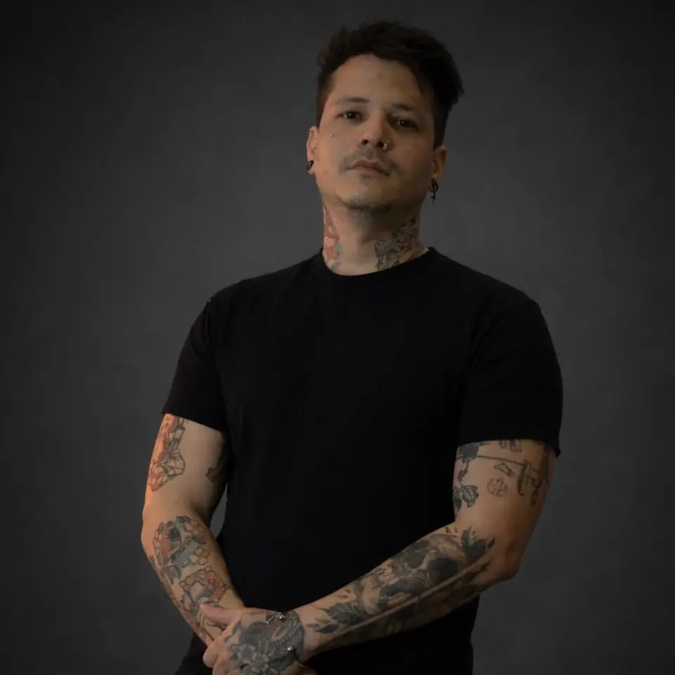 Portrait of Endris Godefoy, tattoo artist at House en Llamas Tattoo