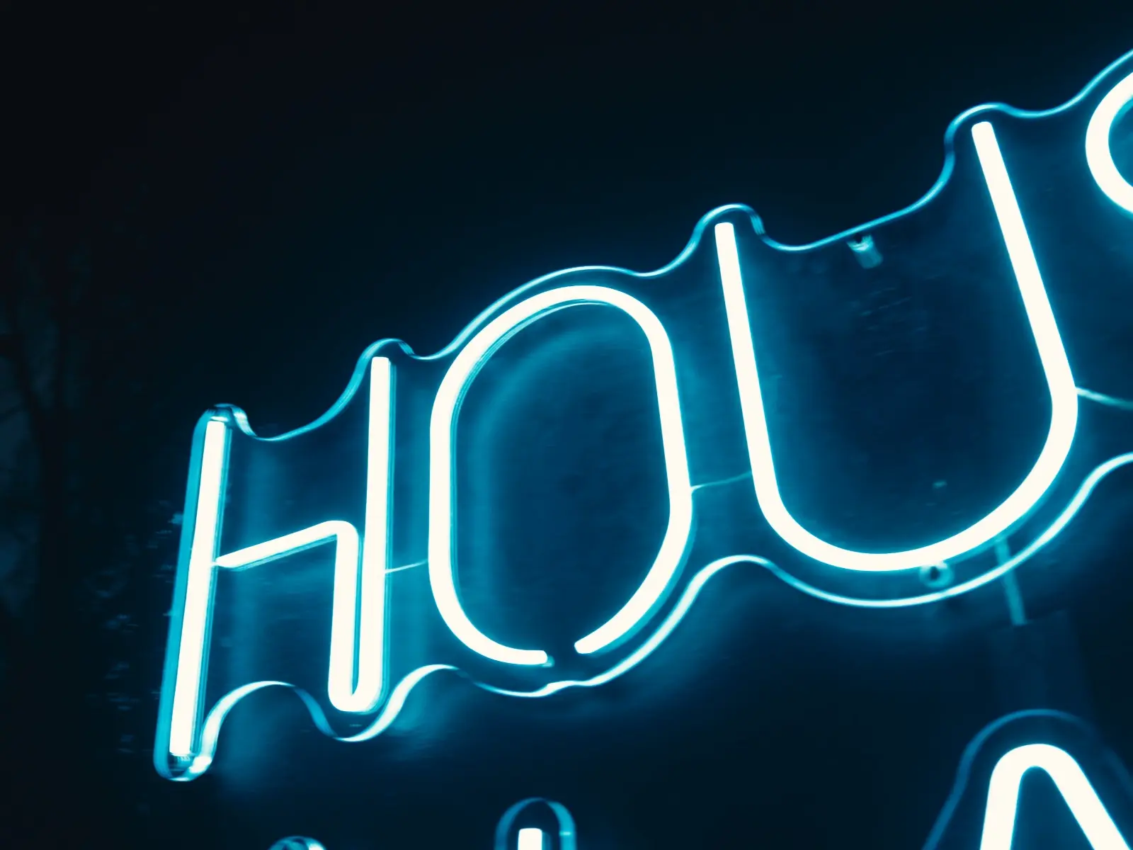 Close view of the House en Llamas neon sign
